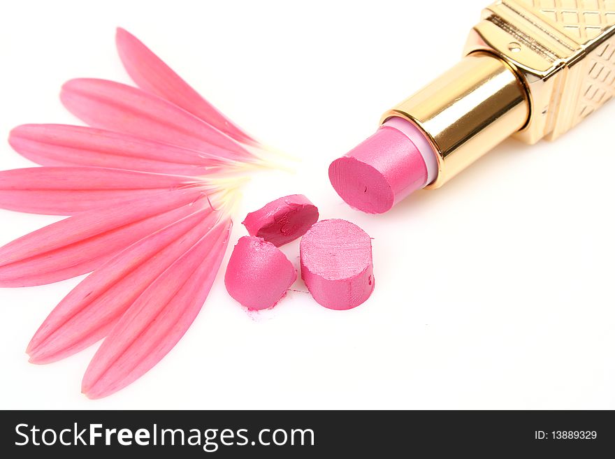 Pink lipstick on a white background