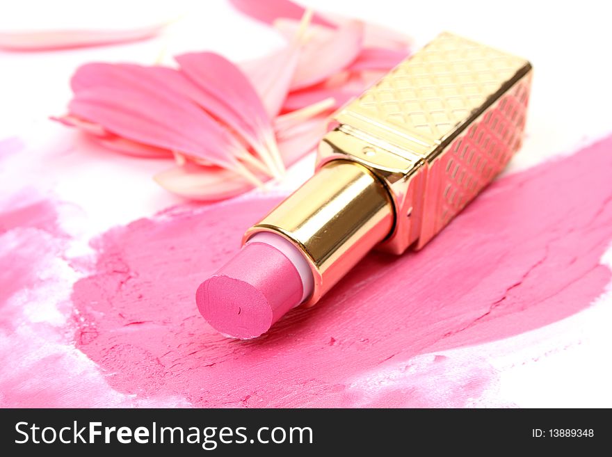 Pink lipstick on a white background