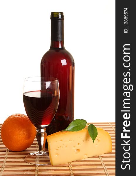 Wine and cheese on a white background