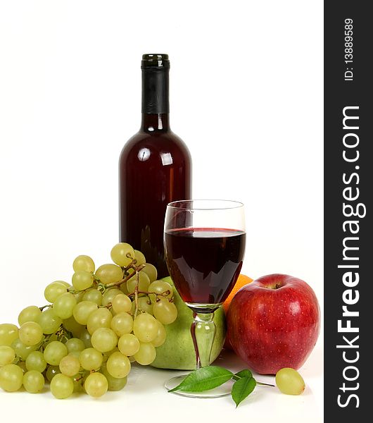 Wine and fruit on a white background