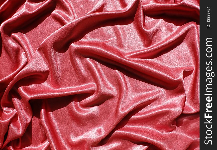 Red satin texture abstract background. Red satin texture abstract background