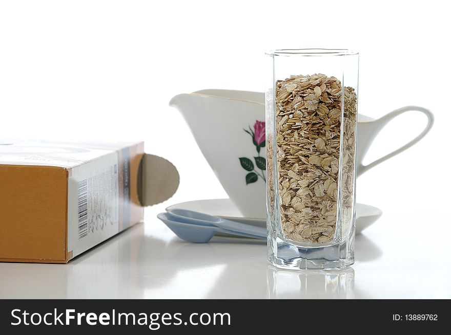 Stack of oat flakes on the kitchen table