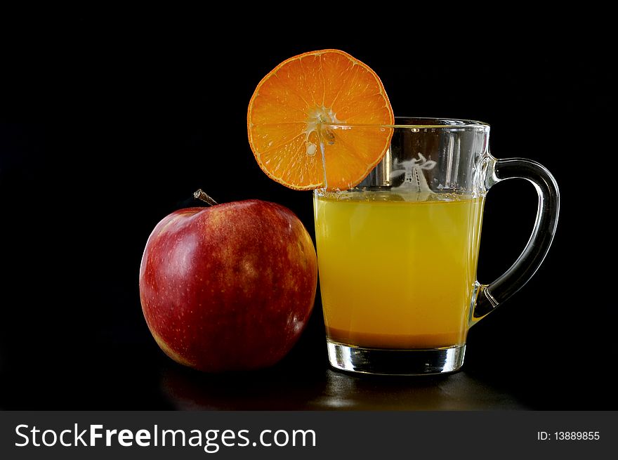 Fruit juice against the black background