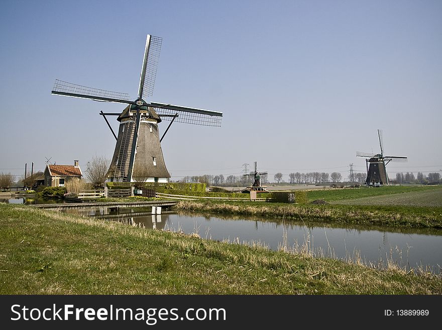 A couple of windmills at the Rotte, the Netherlands. A couple of windmills at the Rotte, the Netherlands