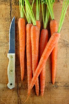 Carrots And Knife On Wood Stock Images Carrots And Knife On Wood Stock Images