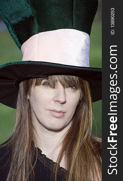 Girl with big hat at a birthday party. Girl with big hat at a birthday party