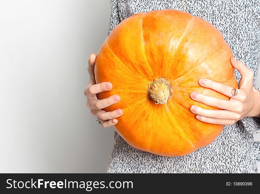 Young Girl And Yellow Pumpkin