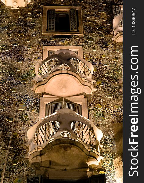 Detail of the balconies of the Casa Batllo at night, in Barcelona, Spain. A wonderful building of the Catalan architect Antoni Gaudi, 1907