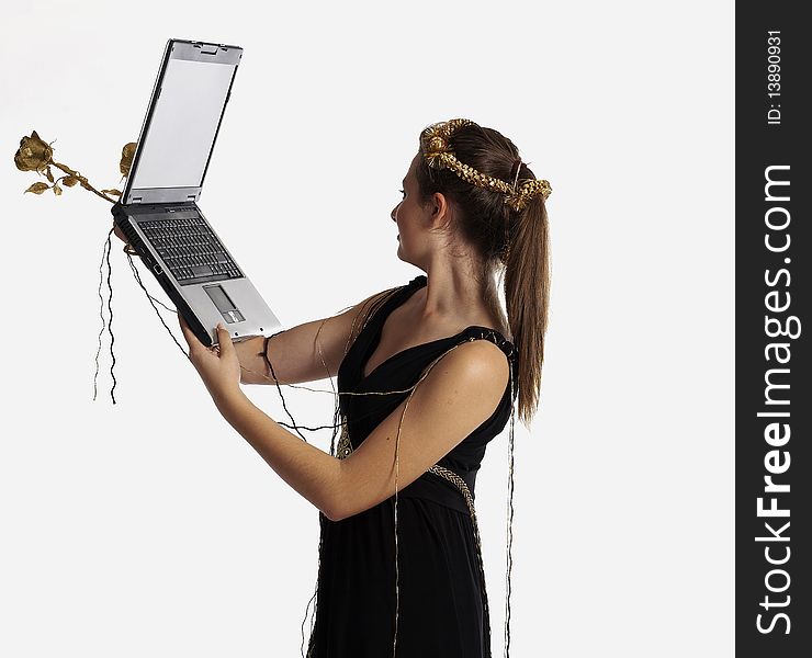 Young woman using a laptop while sitting on the floor. Young woman using a laptop while sitting on the floor