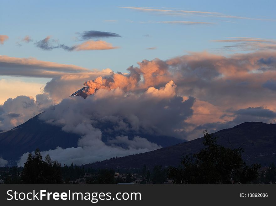 Tungurahua - active volcano with ask cloud at sunset in Ecuador. Tungurahua - active volcano with ask cloud at sunset in Ecuador