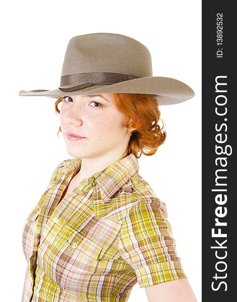 Girl in cowboy hat isolated on white