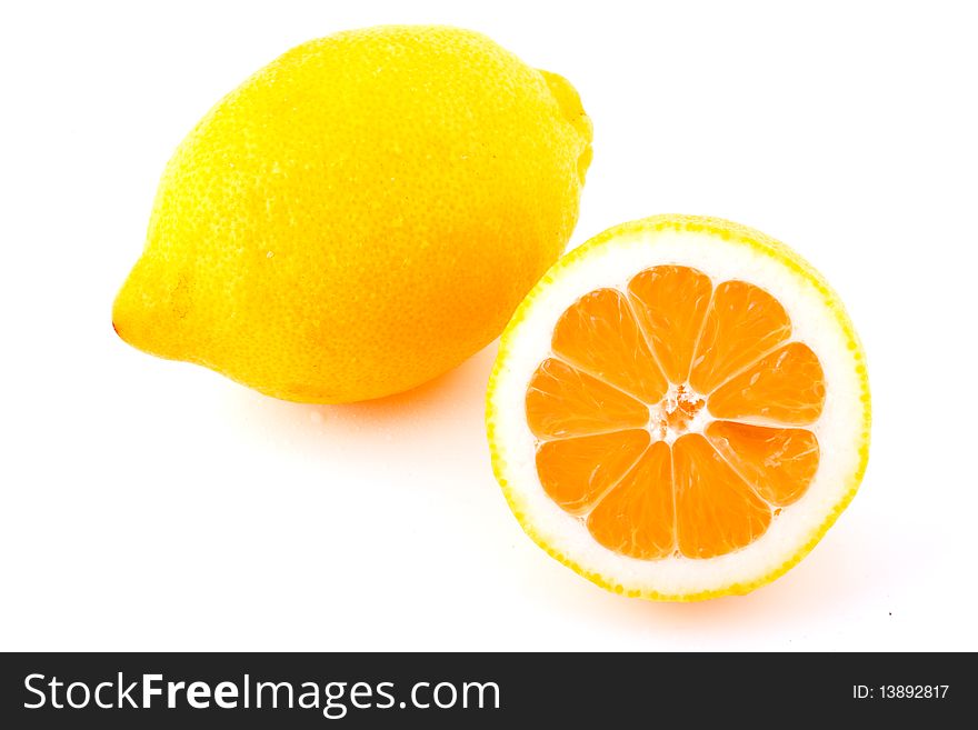 Whole Lemon and Half on White Background