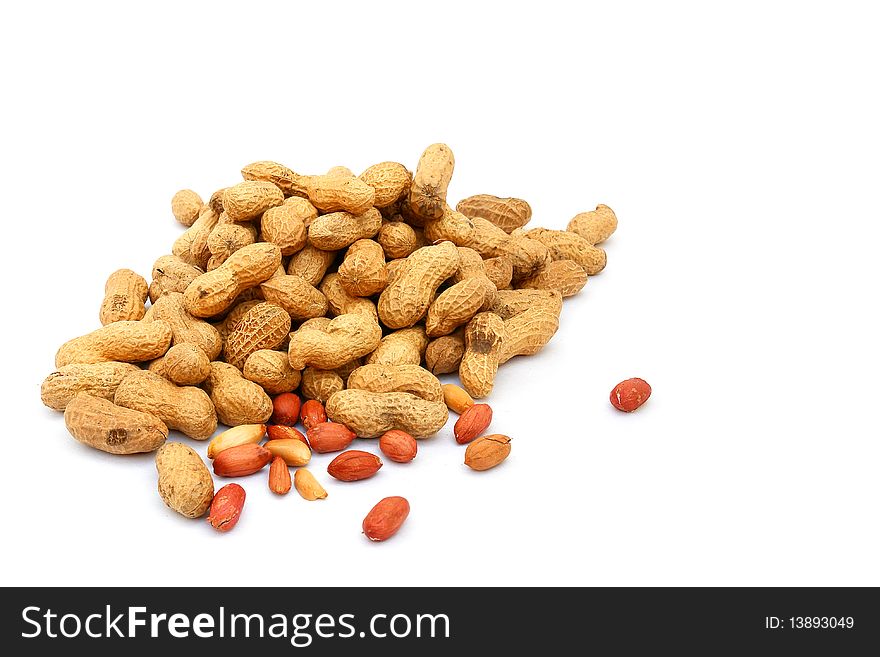 Handful of peanuts on a white background, isolated