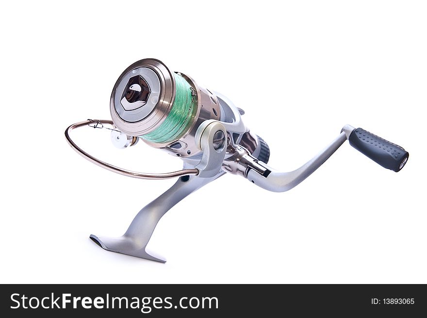 Steel fishing reel on white background isolated