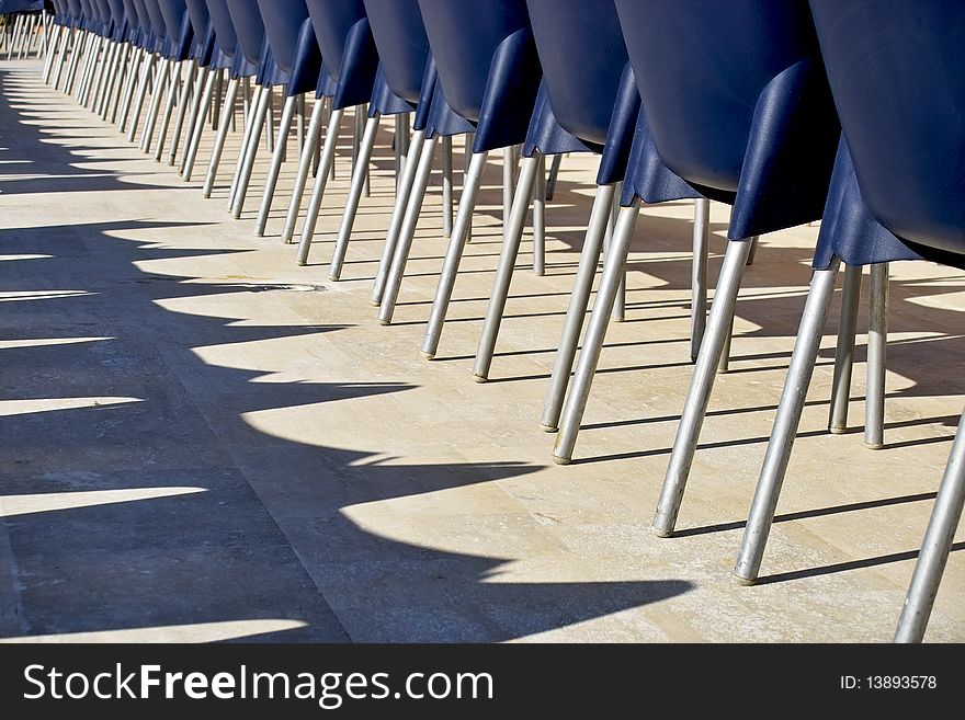 Row of blue chairs in a holiday resort, Turkey