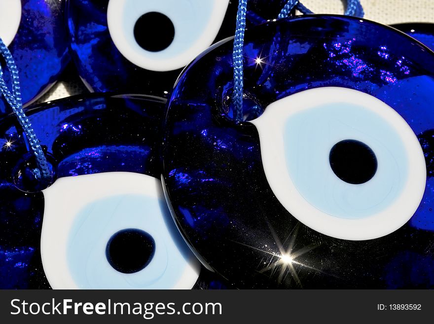 Bright blue evil eye souvenir jewelry from Turkey. Bright blue evil eye souvenir jewelry from Turkey