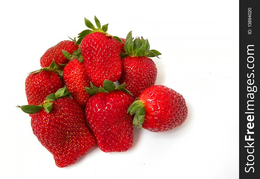 juicy strawberries isolated on white background .