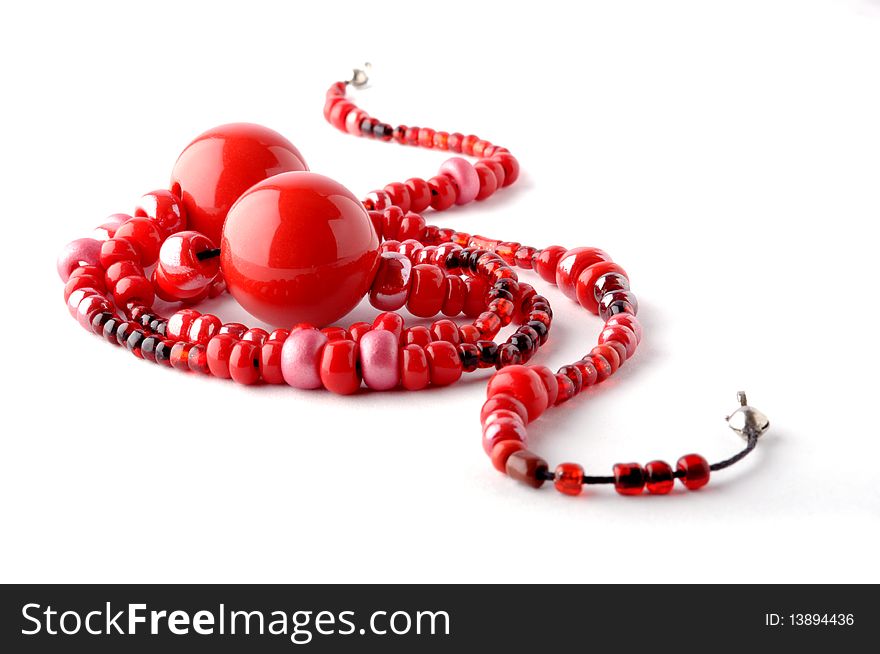 Gemstone red necklace isolated on white background