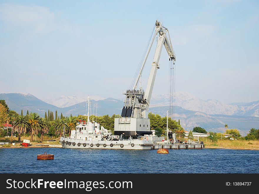 Tug boat and ships rane. Tug boat and ships rane