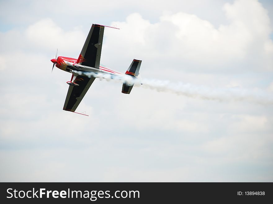 Airsow airplane on the sky with clouds