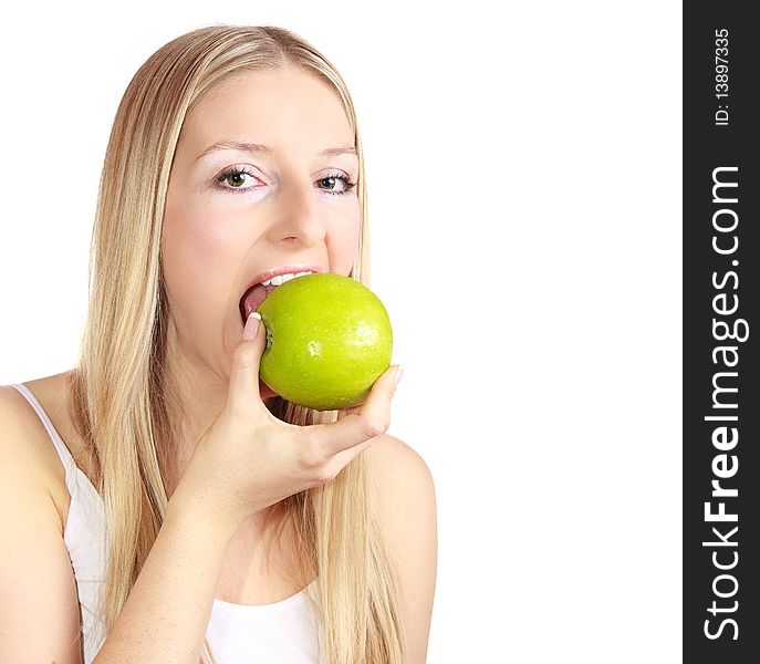 Caucasian blond woman with apple on isolated background