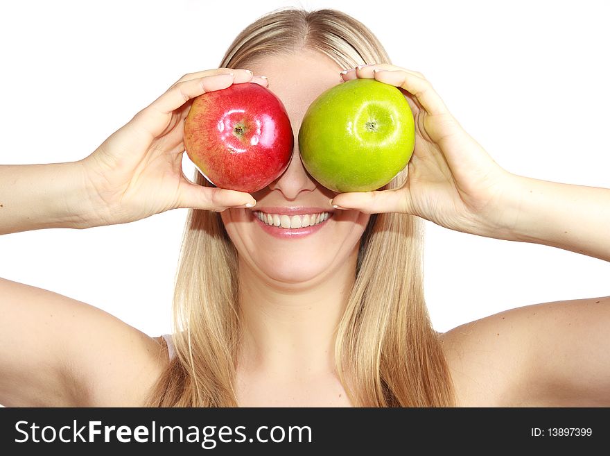 Caucasian blond woman with apples on isolated background