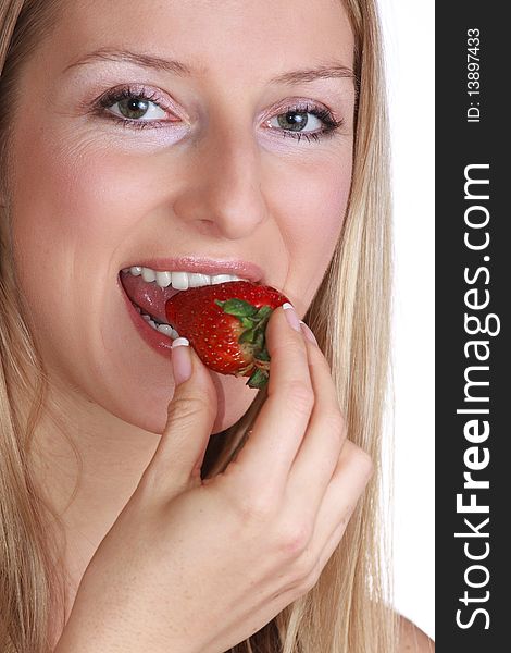 Caucasian girl with strawberry on white isolated background