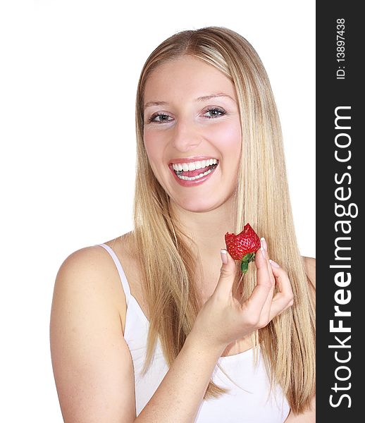 Woman eating strawberry