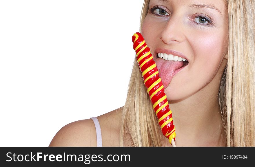 Caucasian blond woman licking lolipop. Caucasian blond woman licking lolipop