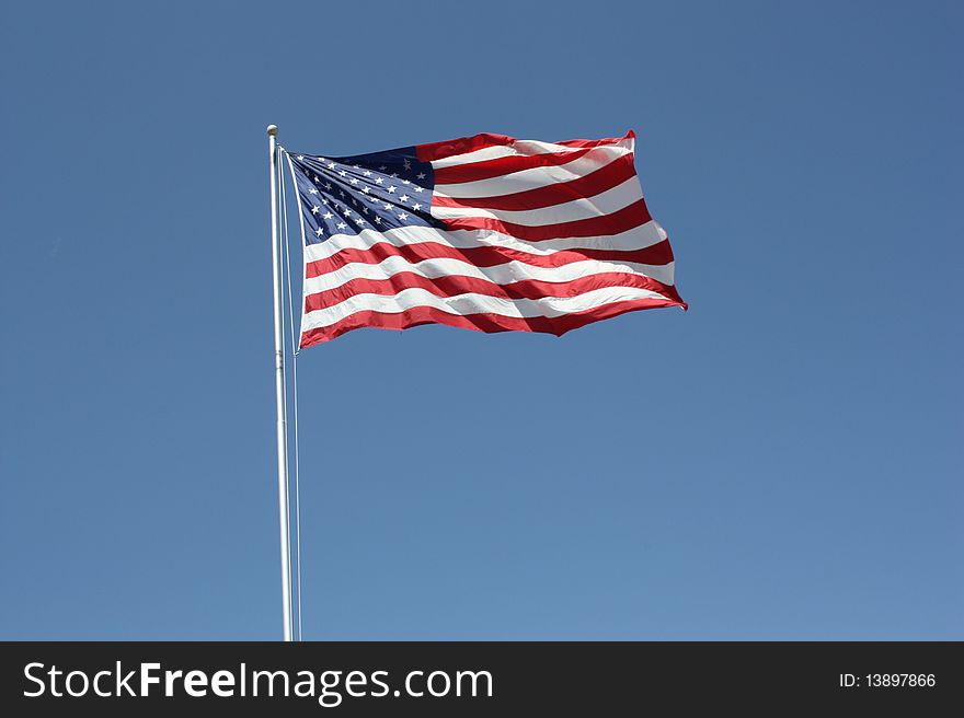 USA flag waving in the wind. USA flag waving in the wind