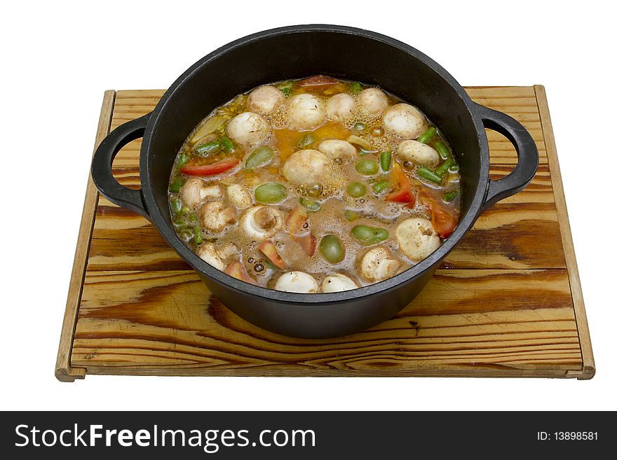 A hearty stew being prepared in a cast-iron pot, isolated on a white background.
