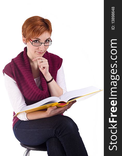 Sitting girl reading book isolated on white background. Sitting girl reading book isolated on white background