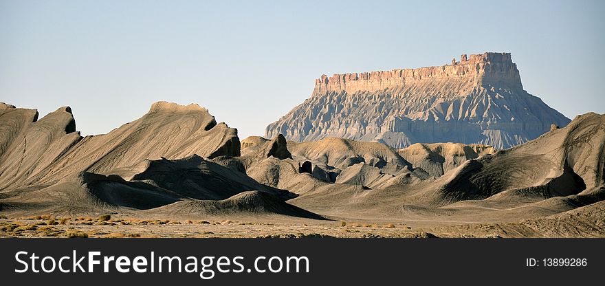 Lunar landscape seen somewhere in the middle of Utah, USA. This serves as a training ground for motorcycle trials (numerous wheel tracks). Lunar landscape seen somewhere in the middle of Utah, USA. This serves as a training ground for motorcycle trials (numerous wheel tracks)