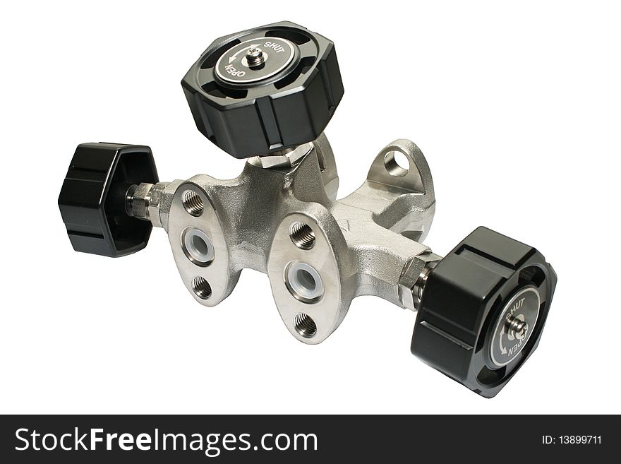 Valve unit for measuring devices. Close-up. Isolated on a white background. Valve unit for measuring devices. Close-up. Isolated on a white background.