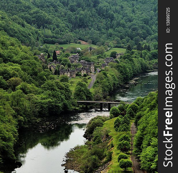 A village in a valley as seen from Barrage L'agile near correze france. A village in a valley as seen from Barrage L'agile near correze france