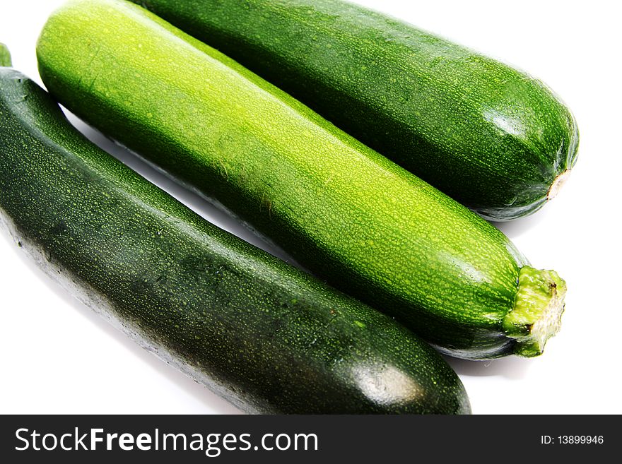 Green vegetable marrows isolated on a white background