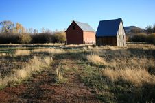 Two Barns In A Field Royalty Free Stock Photos