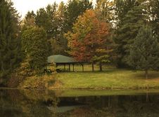 Picnic Shelter By Pond With Fall Reflections Stock Photo Picnic Shelter By Pond With Fall Reflections Stock Photo