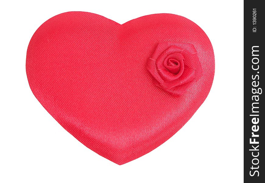 Red fabric heart with little rose over white background. Red fabric heart with little rose over white background
