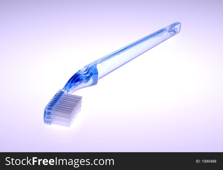 Photo of a Toothbrush With Light From Below - Everyday Item