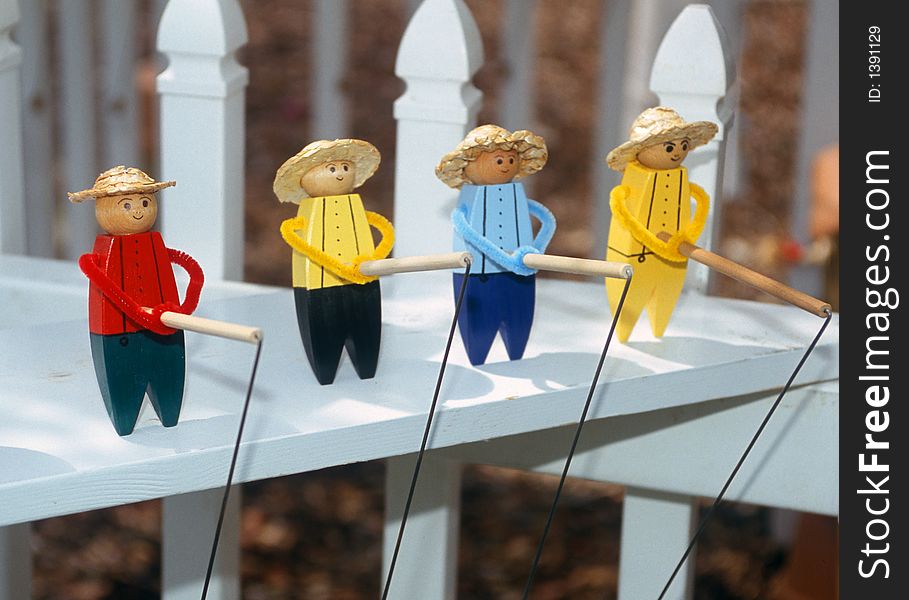 Handcrafted self balancing toy figures fishing