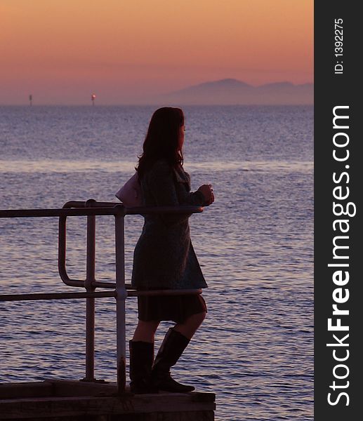 Girl On A Pier