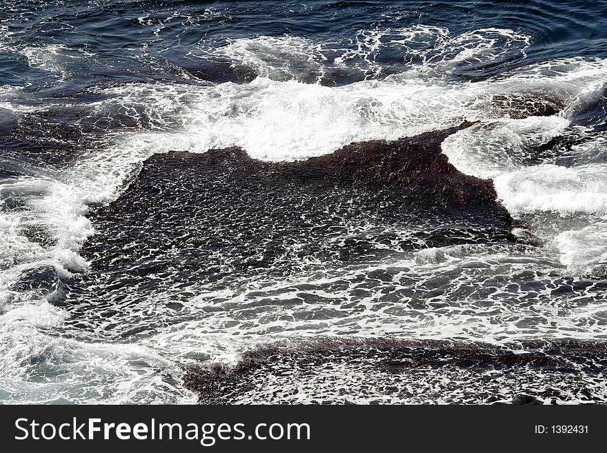 Waves Hitting The Rocks At The Australian Coast. Waves Hitting The Rocks At The Australian Coast