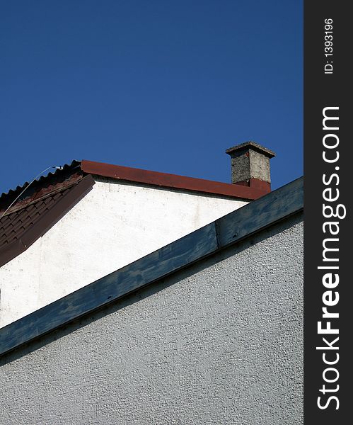 Wall, roof and chimney in the sunny day. Wall, roof and chimney in the sunny day