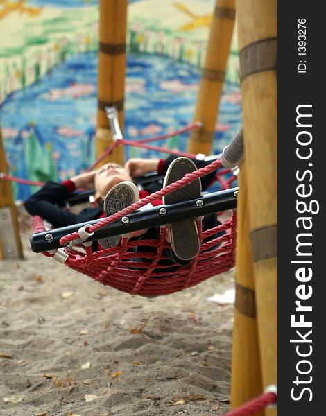 The girl lying in the hammock. The girl lying in the hammock