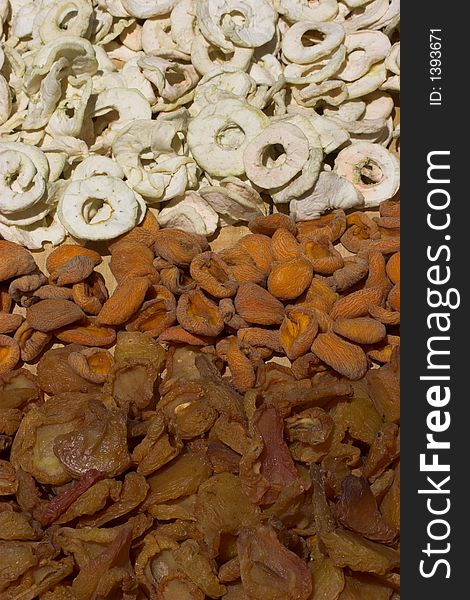 Dried fruit on drying rack, peach, apple and pear,