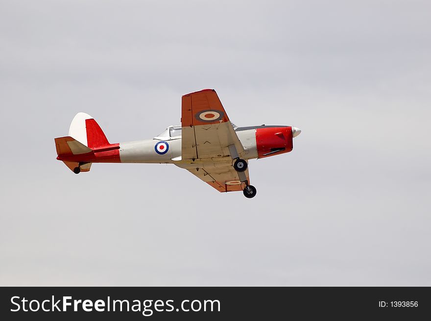 A De Havilland DHC1 Chipmunk flies past during an air show.