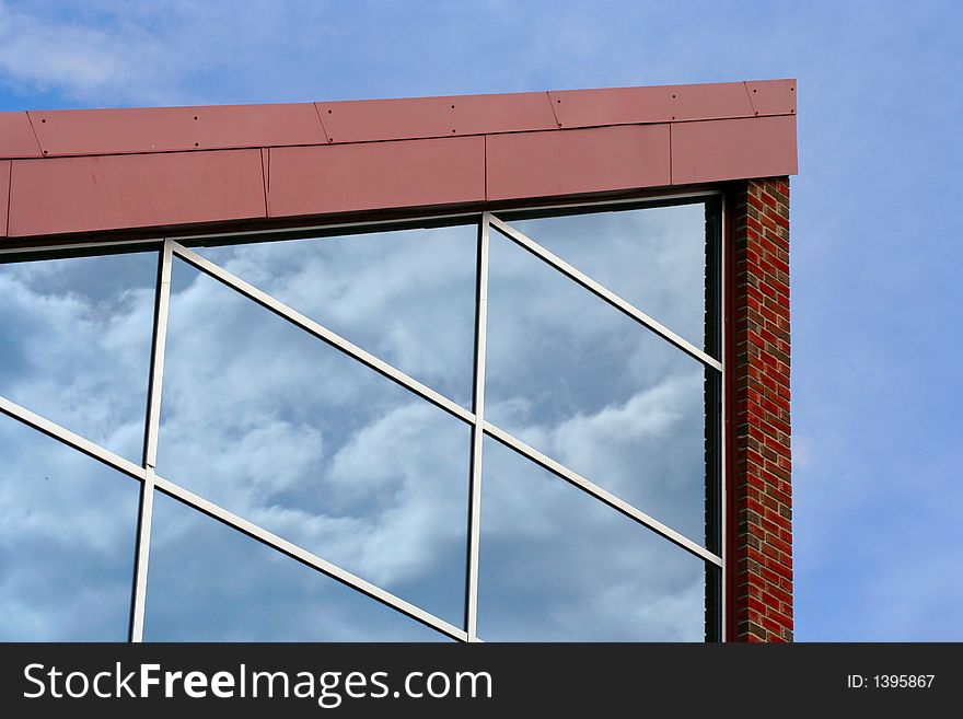 Modern building with sky reflectioons in the glass. Modern building with sky reflectioons in the glass
