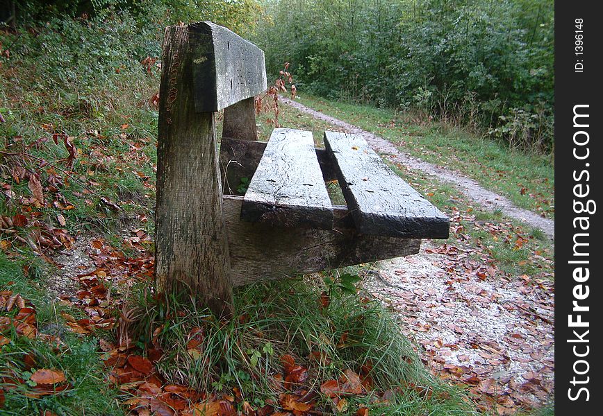 Old wooden bench on danebury hill near andover uk. Old wooden bench on danebury hill near andover uk
