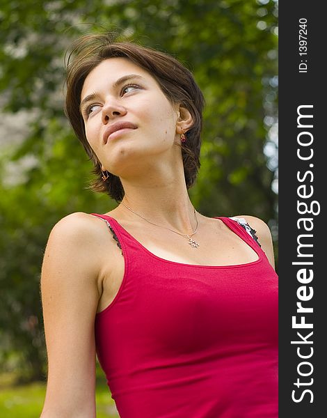 Young woman relaxing in the park. Young woman relaxing in the park